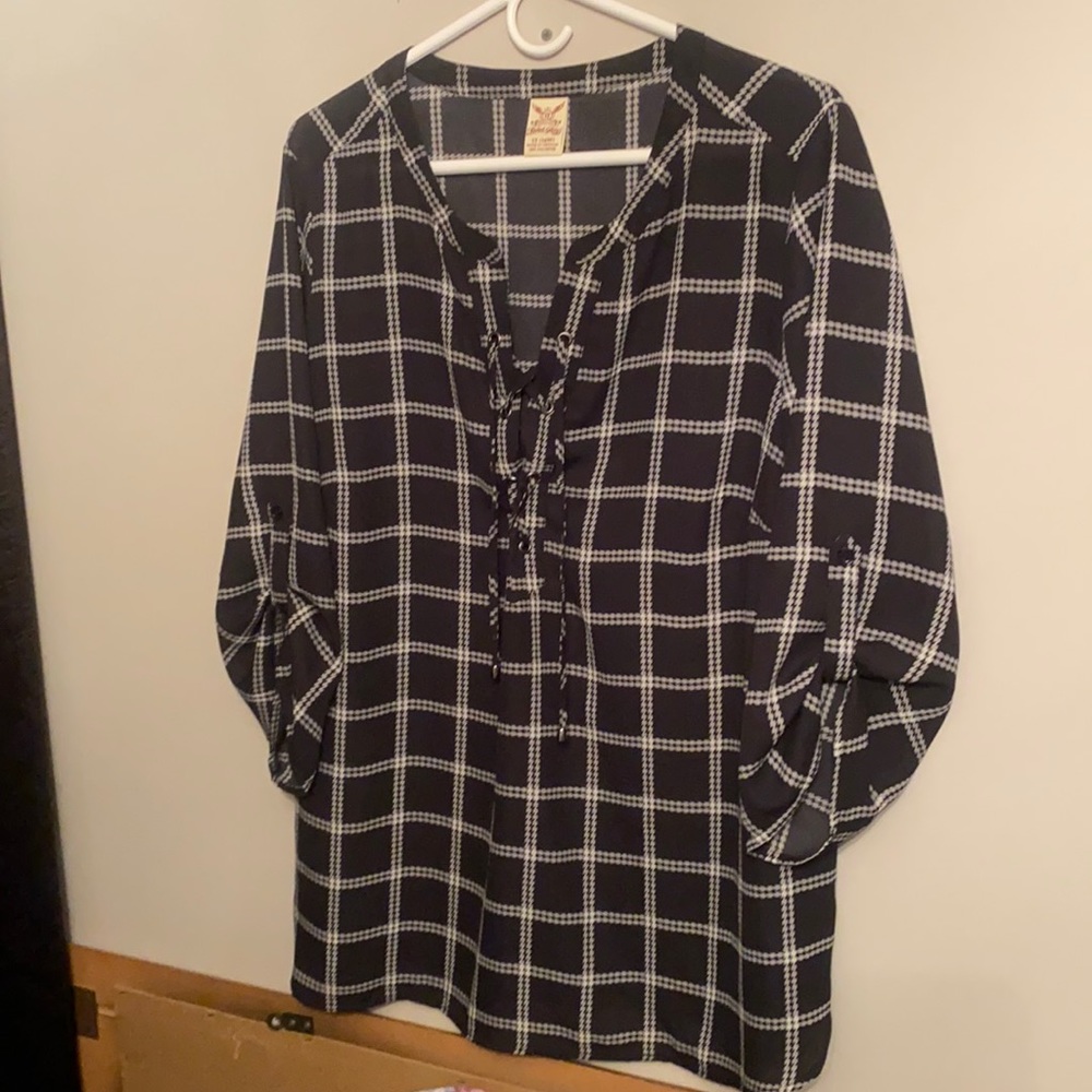 Woman’s Black and White Blouse